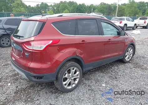 2014 Ford Escape Titanium z USA, uszkodzony, nr VIN 1FMCU9J97EUC17124